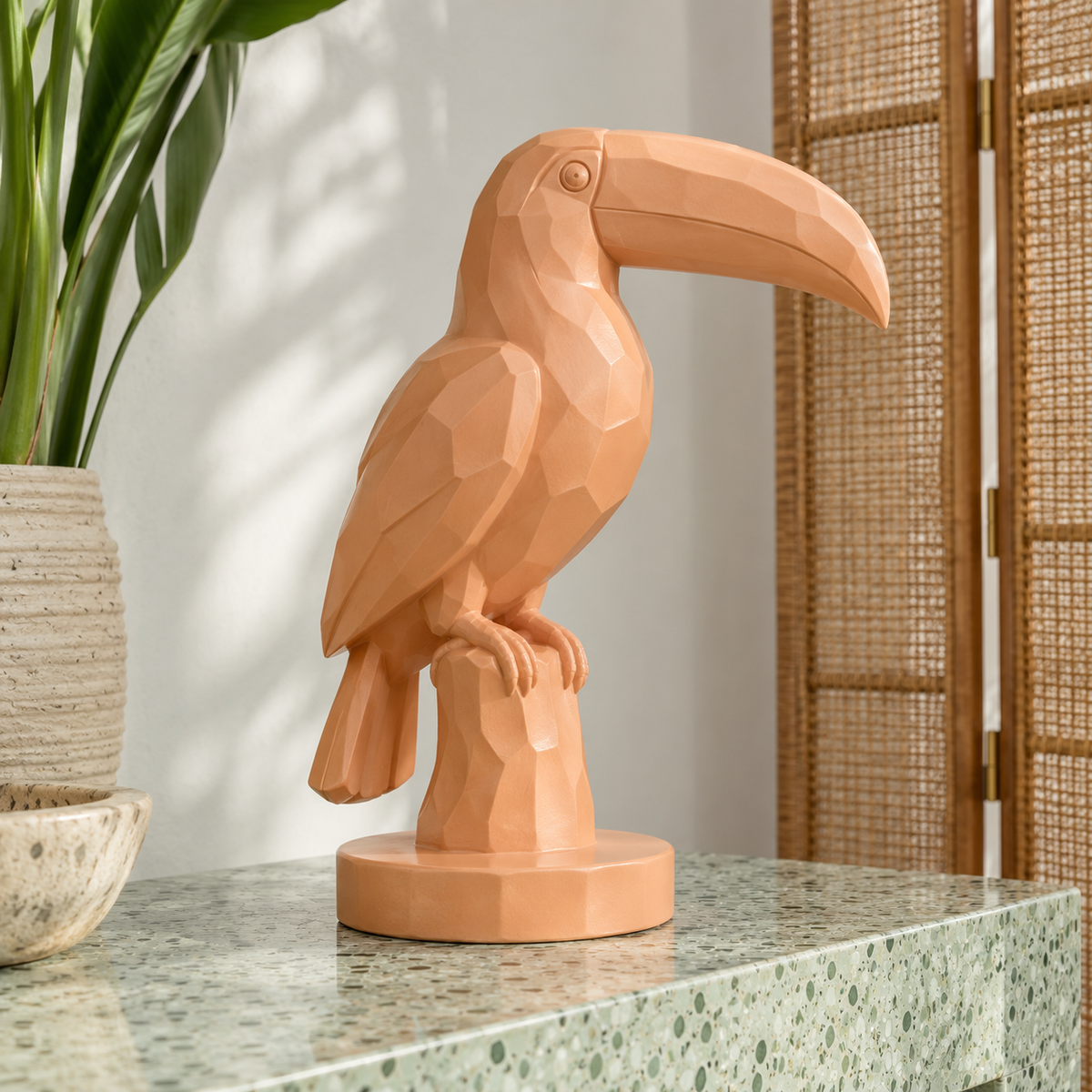 Apricot Perch, apricot fiberglass geometric toucan sculpture, featured installation view