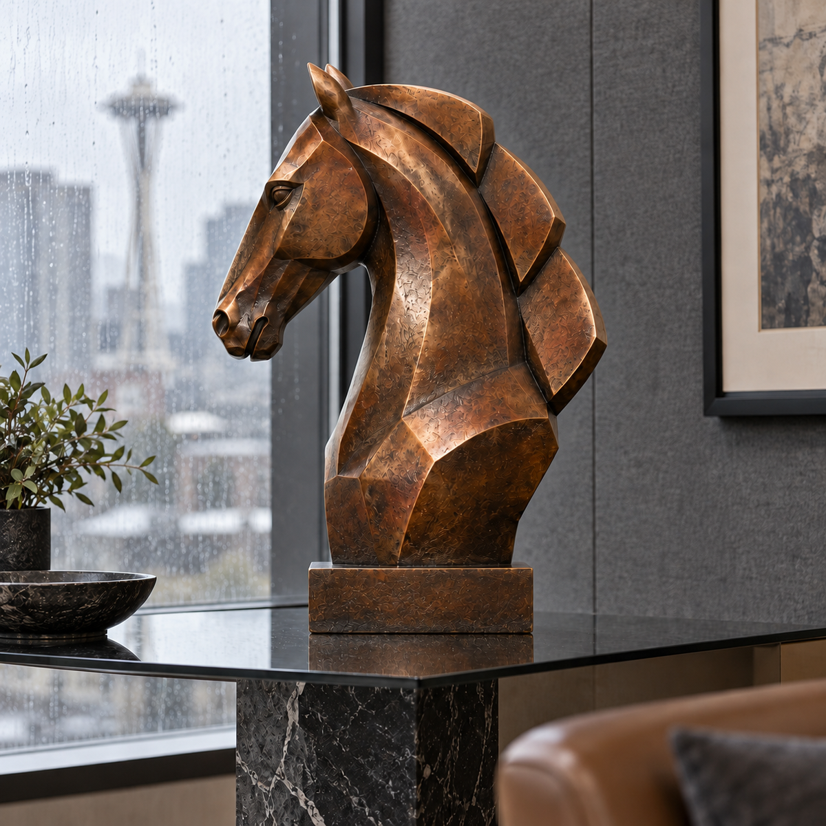 Side view of the warm bronze geometric horse bust sculpture in a Seattle office lounge.