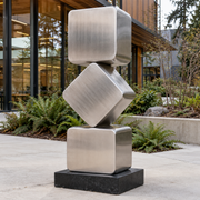Horizon Cairn, brushed stainless steel stacked square totem sculpture, featured installation view